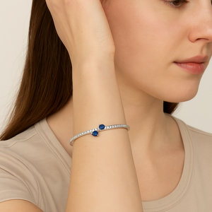 Sterling Silver Bangle with Blue Gemstones - PEACORA