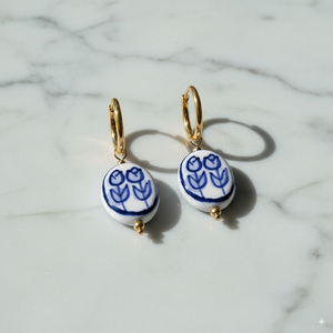 Stainless Steel Hoop Earrings with Blue Floral Charm – Gold Finish - PEACORA