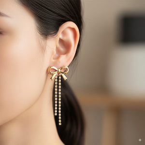 Gold Bow Earrings with Crystal Tassel Drops