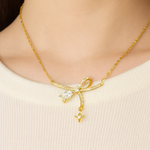 Load image into Gallery viewer, Gold Vermeil Bow and Star Necklace
