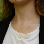Load image into Gallery viewer, Gold Radiant Halo Pendant Necklace - PEACORA

