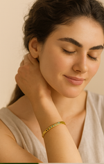 Load image into Gallery viewer, Radiant Gold Plated Stainless Steel Bangle - PEACORA
