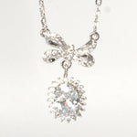 Load image into Gallery viewer, Oval Crystal Bow Necklace
