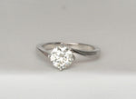 Load image into Gallery viewer, Cradled Solitaire Round Moissanite Ring
