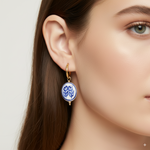 Load image into Gallery viewer, Stainless Steel Hoop Earrings with Blue Floral Charm – Gold Finish - PEACORA
