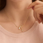 Load image into Gallery viewer, Gold Vermeil Bow and Star Necklace - PEACORA
