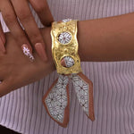 Load image into Gallery viewer, Stainless Steel Bangle Bracelet – Gold Finish with Scarf Bow - PEACORA
