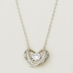 Load image into Gallery viewer, Silver Heart Embrace Pendant Necklace - PEACORA
