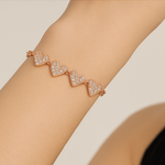 Load image into Gallery viewer, Cascading Hearts 14K Rose Gold-Plated Sterling Silver Bracelet - PEACORA
