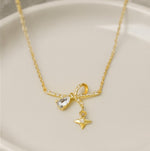 Load image into Gallery viewer, Gold Vermeil Bow and Star Necklace
